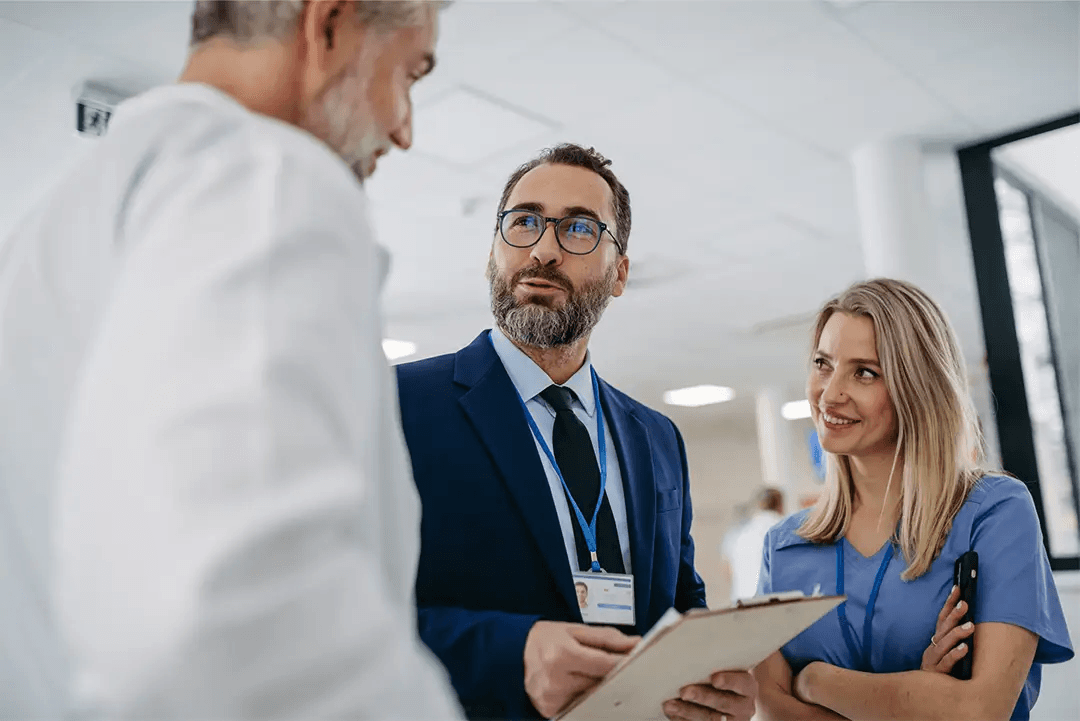 Clinicians reviewing a chart together