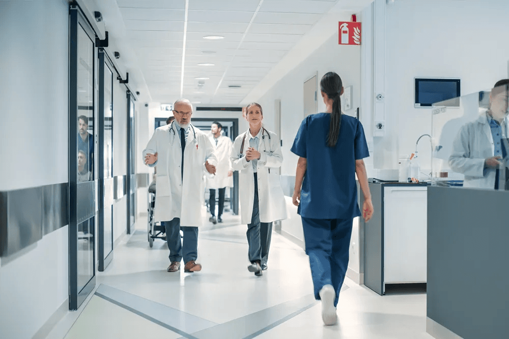 Clinicians in a hospital hallway